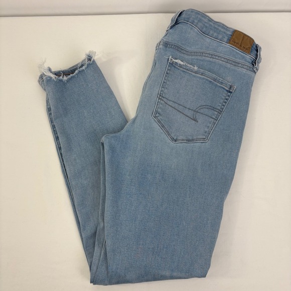 American Eagle Outfitters Denim - American Eagle High Rise Jegging Light Wash Distressed Frayed Hem Jeans Size 10